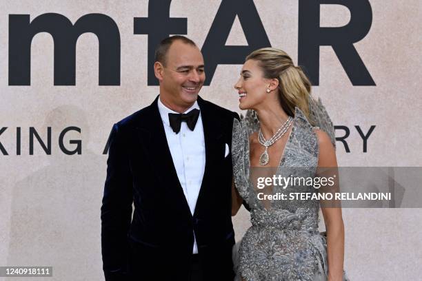 AmfAR Global Fundraising Chair Milutin Gatsby and US model Jessica Michel arrive on May 26, 2022 to attend the annual amfAR Cinema Against AIDS...