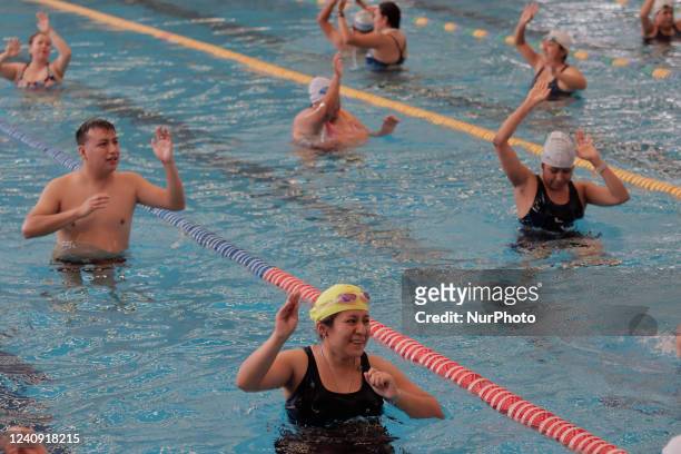 Group of inhabitants of Milpa Alta in Mexico City, during an exhibition of Aqua Zumba or zumba in the pool on the occasion of the 20th anniversary of...