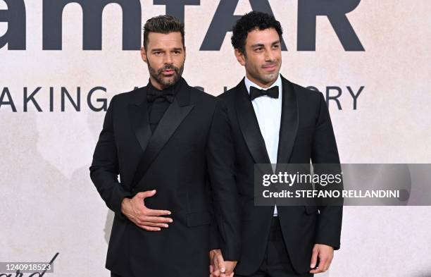 Puerto Rican singer actor Ricky Martin and Syrian-born Swedish painter Jwan Yosef arrive on May 26, 2022 to attend the annual amfAR Cinema Against...