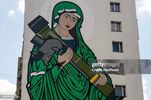 The mural &quot;St. Javelina&quot;, a symbolic figure of Madonna holding a US anti-tank missile &quot;Javelin&quot; system, used by the Ukrainian...