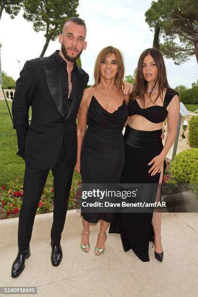 Vladimir Restoin Roitfeld, Carine Roitfeld and Julia Restoin Roitfeld attend the amfAR Gala Cannes 2022 at the Hotel du Cap-Eden-Roc on May 26, 2022...