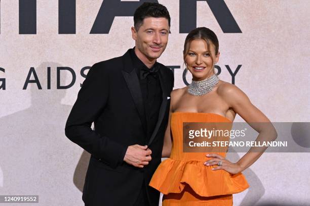 Polish striker Robert Lewandowski and his wife Anna Lewandowska arrive on May 26, 2022 to attend the annual amfAR Cinema Against AIDS Cannes Gala at...