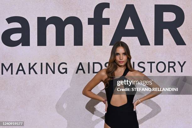 Model Hana Cross arrives on May 26, 2022 to attend the annual amfAR Cinema Against AIDS Cannes Gala at the Hotel du Cap-Eden-Roc in Cap d'Antibes,...
