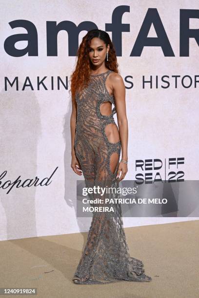 Puerto Rican model Joan Smalls arrives on May 26, 2022 to attend the annual amfAR Cinema Against AIDS Cannes Gala at the Hotel du Cap-Eden-Roc in Cap...