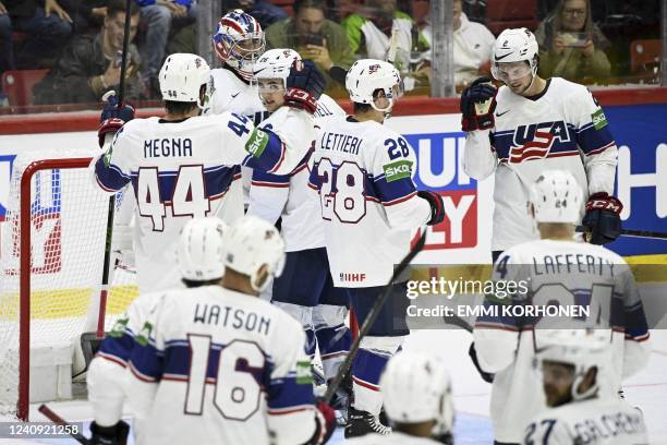S team celebrates after winning the IIHF Ice Hockey World Championships quarter-final match between Switzerland and United States in Helsinki,...