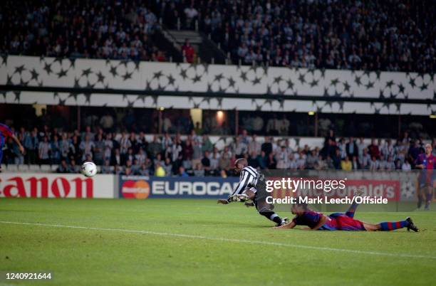 September 1997 Newcastle-upon-Tyne - UEFA Champions League - Newcastle United v FC Barcelona - Faustino Asprilla of Newcastle beats Michael Reiziger...