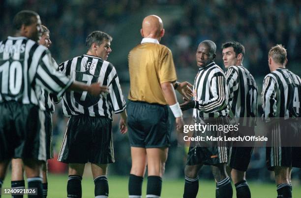 September 1997 Newcastle-upon-Tyne - UEFA Champions League - Newcastle United v FC Barcelona - Faustino Asprilla of Newcastle protests to referee...