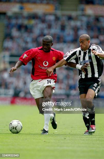 August 2003, FA Premiership, Newcastle United v Manchester United, Eric Djemba-Djemba of Manchester United and Kieron Dyer of Newcastle.