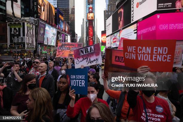 Demonstrators from "Gays against Guns" protest against gun violence two days after the Robb Elementary School mass shooting in Texas, at Times Square...