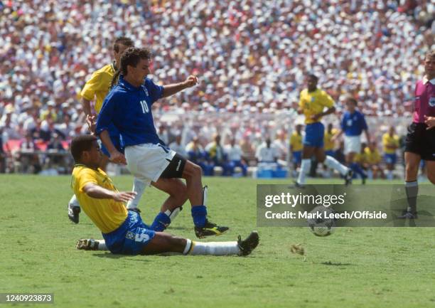 July 1994, Pasadena, FIFA World Cup Final, Brazil v Italy - Roberto Baggio of Italy is tackled by Mauro Silva.