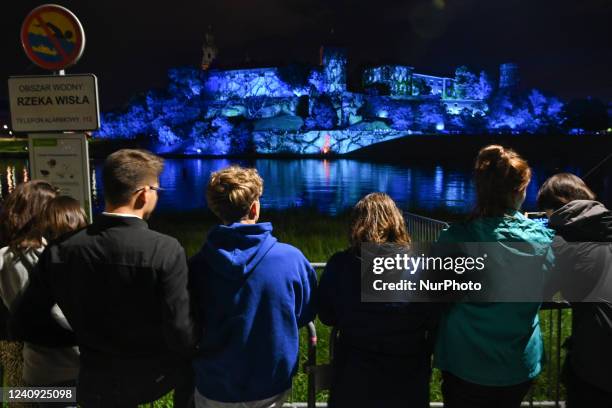 People watching the famous Wawel Castle illuminated during the Stranger Things 4 light show. Today, on the eve of the release of the fourth season of...