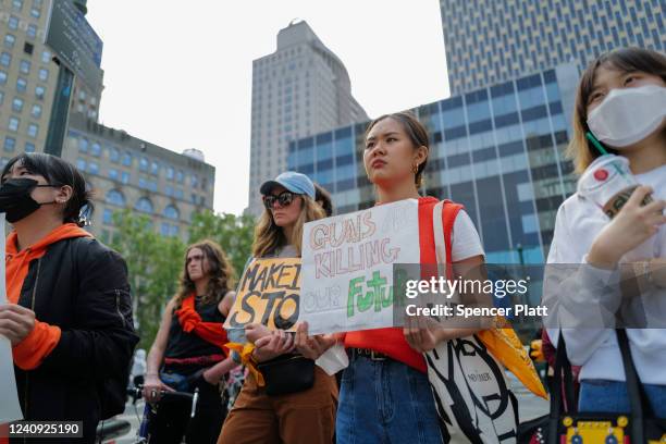 Gun rights activists, including the group Youth Over Guns, participate in a rally in Foley Square to demand an end to gun violence on May 26, 2022 in...