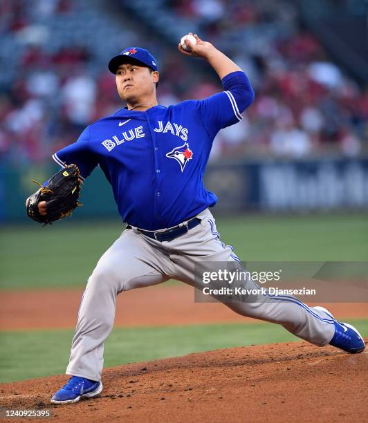 Starting pitcher Hyun Jin Ryu of the Toronto Blue Jays throws against the Los Angeles Angels during the second inning at Angel Stadium of Anaheim on...