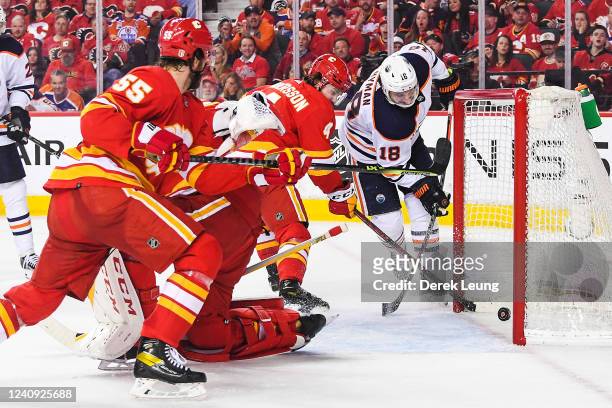 Zach Hyman of the Edmonton Oilers scores on Jacob Markstrom of the Calgary Flames during the second period of Game Five of the Second Round of the...