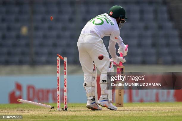 Bangladesh's Mushfiqur Rahim is clean bowled off Sri Lanka's Kasun Rajitha during the final day of the second Test cricket match between Bangladesh...