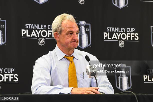 Head coach of the Calgary Flames, Darryl Sutter, speaks to media after losing to the Edmonton Oilers during the overtime period of Game Five of the...