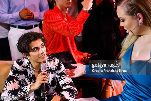 Nic Kaufmann and Nikkie de Jager aka NikkieTutorials during the ABOUT YOU Awards Europe 2022 at Superstudio Maxi on May 26, 2022 in Milan, Italy.