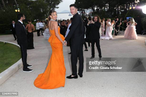 Soccer player Robert Lewandowski and his wife Anna Lewandowska attend amfAR Gala Cannes 2022 at Hotel du Cap-Eden-Roc on May 26, 2022 in Cap...