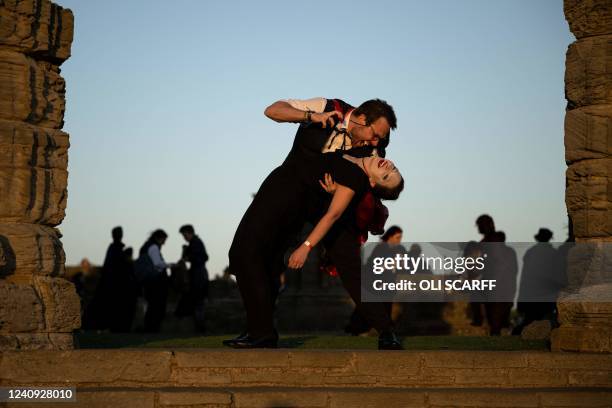 Vampires gather in the grounds of Whitby Abbey following a succesful Guinness world record attempt to gather the largest number of vampires together...