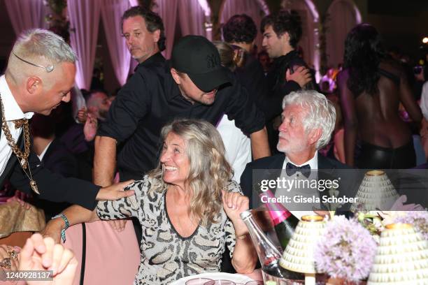 Leonardo DiCaprio and his mother Irmelin Indenbirken and David Ward during the amfAR Cannes Gala 2022 at Hotel du Cap-Eden-Roc on May 26, 2022 in Cap...