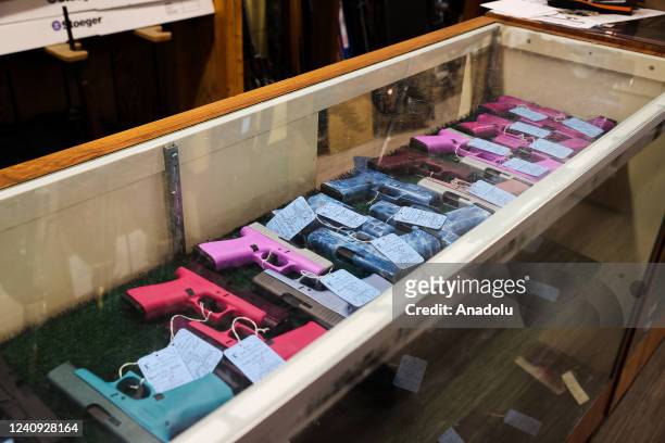 Colorful handguns are seen at the Bobâs Little Sport Gun Shop in the town of Glassboro, New Jersey, United States on May 26, 2022.