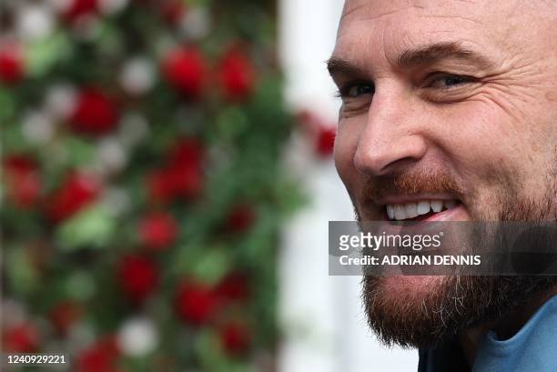 England's newly-appointed Men's Test Head Coach Brendon McCullum poses on the pitch at Lord's Cricket Ground in London on May 27 ahead of the start...