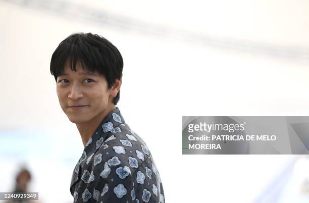 South Korean actor Gang Dong-Won attends a photocall for the film "Broker " during the 75th edition of the Cannes Film Festival in Cannes, southern...