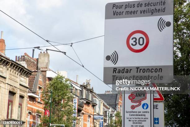 Traffic sign announces a new section control speed camera system on the Gentsesteenweg - Chaussee de Gand, at the Schweizerplein - Place Schweitzer,...