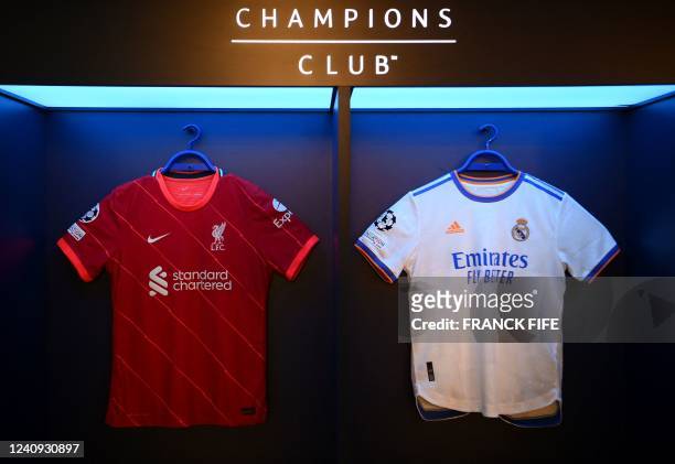 Picture taken in Paris on May 27, 2022 shows the jersey's of the playing teams Liverpool FC and Real Madrid on the eve of the UEFA Champions League...