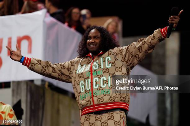 Baker Boy performs at half time during the 2022 AFL Round 11 match between the Sydney Swans and the Richmond Tigers at the Sydney Cricket Ground on...