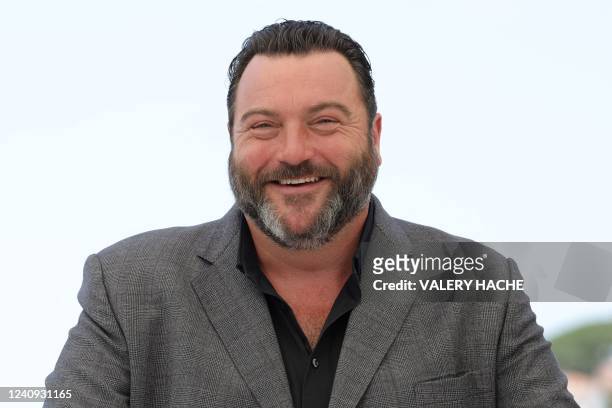 French actor Denis Menochet poses during a photocall for the film "As Bestas" at the 75th edition of the Cannes Film Festival in Cannes, southern...