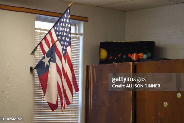 An American flag and Texas flag in a classroom at the Utopia School District on May 26, 2022 in Utopia, Texas. The May 24 shooting at a school in...