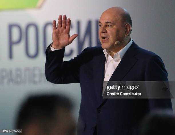 Russian Prime Minister Mikhail Mishustin waves during the 2022 Leaders of Russia Forum's event on May 27, 2022 in Moscow, Russia. Russian...