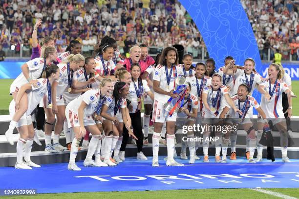 Wendie Renard of Olympique Lyonnais women with the women champions league trophy Olympique Lyonnais women goalkeeper Christiana Endler, Grace Kazadi...