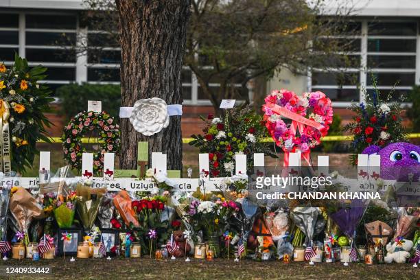 Makeshift memorial for the shooting victims outside Robb Elementary School in Uvalde, Texas, on May 27, 2022. - Texas police faced angry questions...
