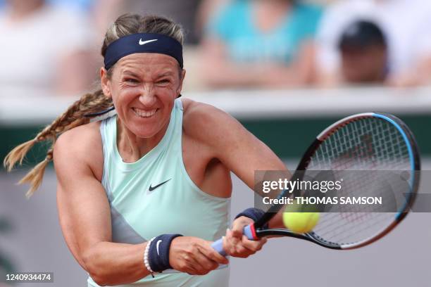 Belarus' Victoria Azarenka returns the ball to Switzerland's Jil Teichmann during their women's singles match on day six of the Roland-Garros Open...