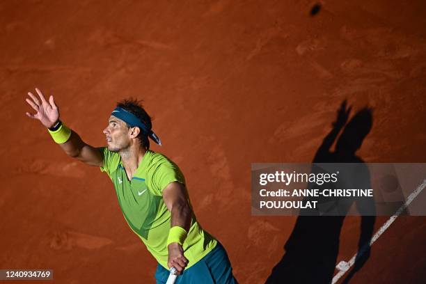 Spain's Rafael Nadal serves the ball as he plays against Netherland's Botic Van De Zandschulp during their men's singles match on day six of the...