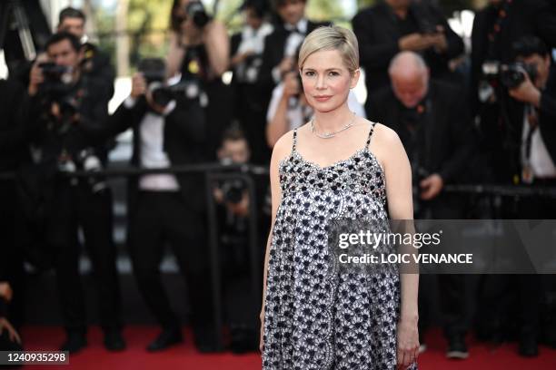 Actress Michelle Williams leaves following the screening of the film "Mother And Son " during the 75th edition of the Cannes Film Festival in Cannes,...