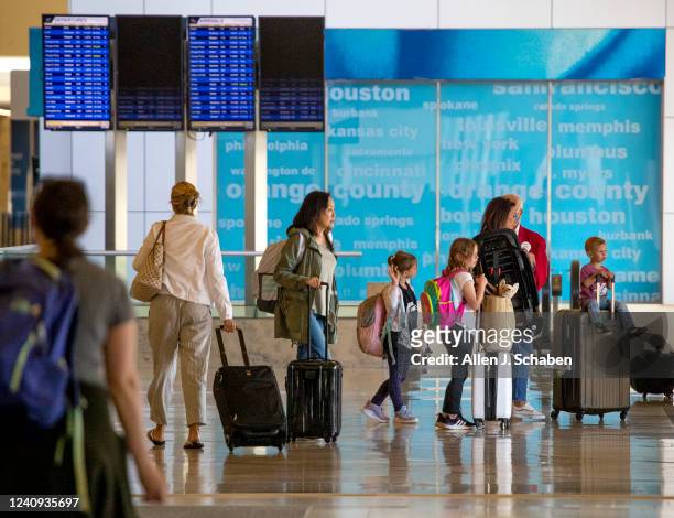 Santa Ana, CA Passengers makes their way to to and from their gates during the Memorial Day weekend getaway at John Wayne Airport Orange County in...