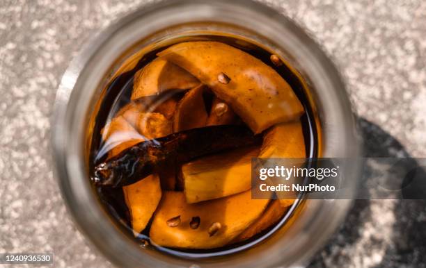 Old Traditional homemade Sun-Dried Raw Mango Pickle in oil known as ''Aam Tel'' is made with mango pickle made with fresh raw mango. In the Bengali...