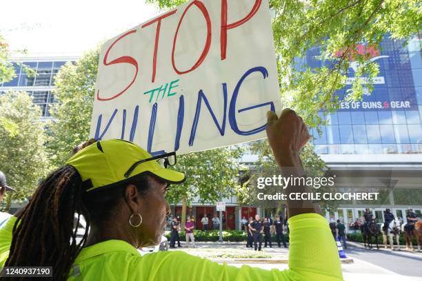 Gun rights activists protest outside of the National Rifle Association Annual Meeting at the George R. Brown Convention Center, on May 27 in Houston,...