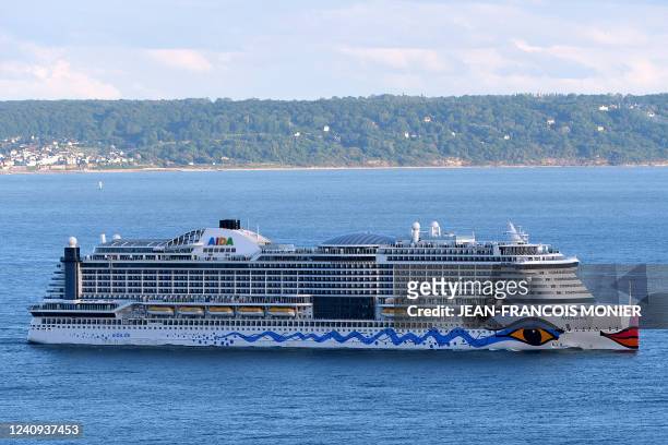 Photograph shows Italian Cruises liner Aidaprima leaving the harbour entrance channel of Le Havre, western France, on May 24, 2022.