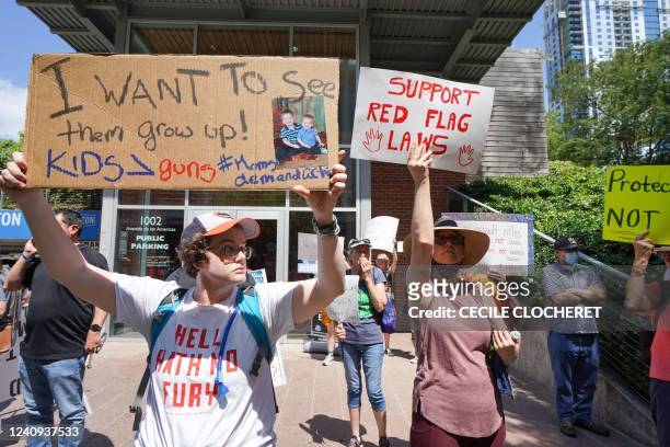 Gun rights activists protest outside of the National Rifle Association Annual Meeting at the George R. Brown Convention Center, on May 27 in Houston,...