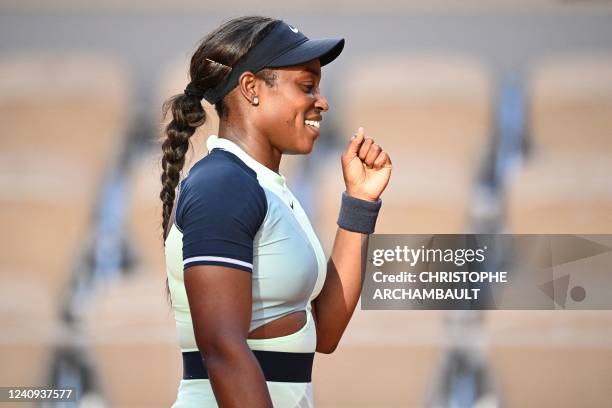 Sloane Stephens reacts after winning against France's Diane Parry at the end of their women's singles match on day six of the Roland-Garros Open...