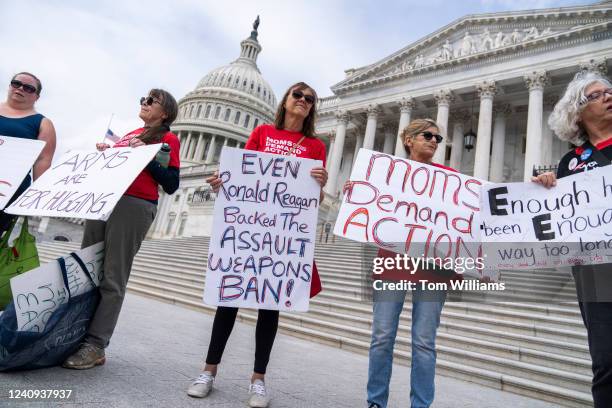 Members of Moms Demand Action for Gun Sense in America demonstrate at the Senate steps of the U.S. Capitol after the latest mass shooting at a Texas...