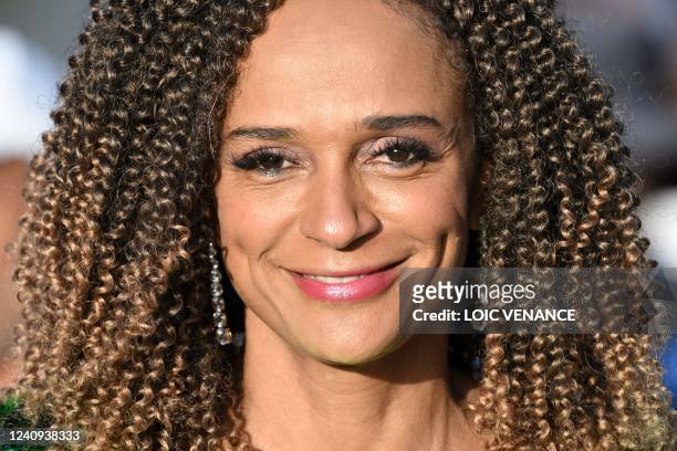 Angolan businesswoman Isabel Dos Santos smiles as she leaves the screening of the film "Mother And Son " during the 75th edition of the Cannes Film...