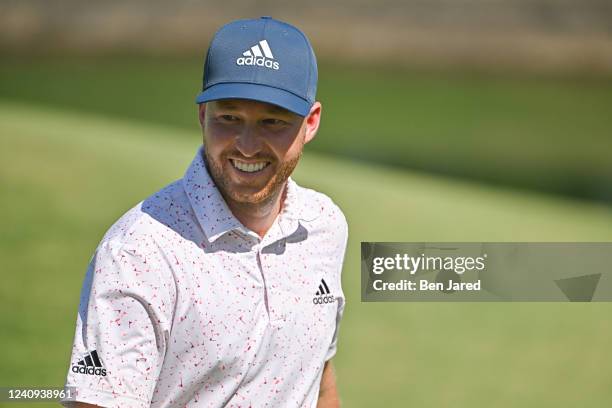 Daniel Berger smiles while walking off the 18th green during the second round of the Charles Schwab Challenge at Colonial Country Club on May 27,...