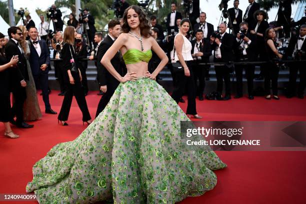 Austrian model Coco Konig arrives for the screening of the film "Mascarade" during the 75th edition of the Cannes Film Festival in Cannes, southern...