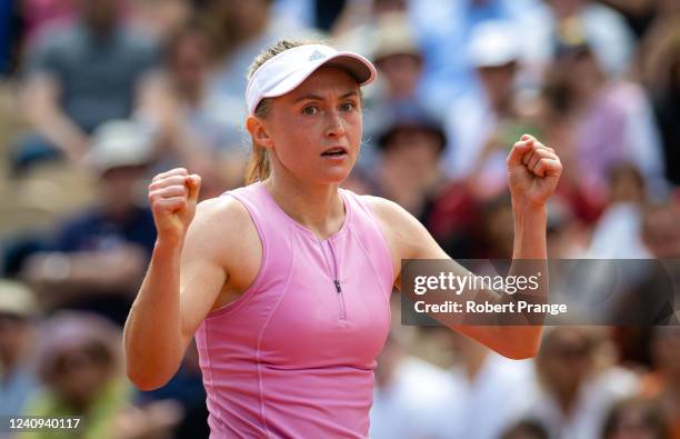 Aliaksandra Sasnovich of Belarus reacts to converting match point against Angelique Kerber of Germany in her third round match on Day 6 at Roland...