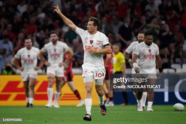 Toulon's French scrum-half Baptiste Serin celebrates after scoring his team's first try during the European Challenge Cup rugby union final match...